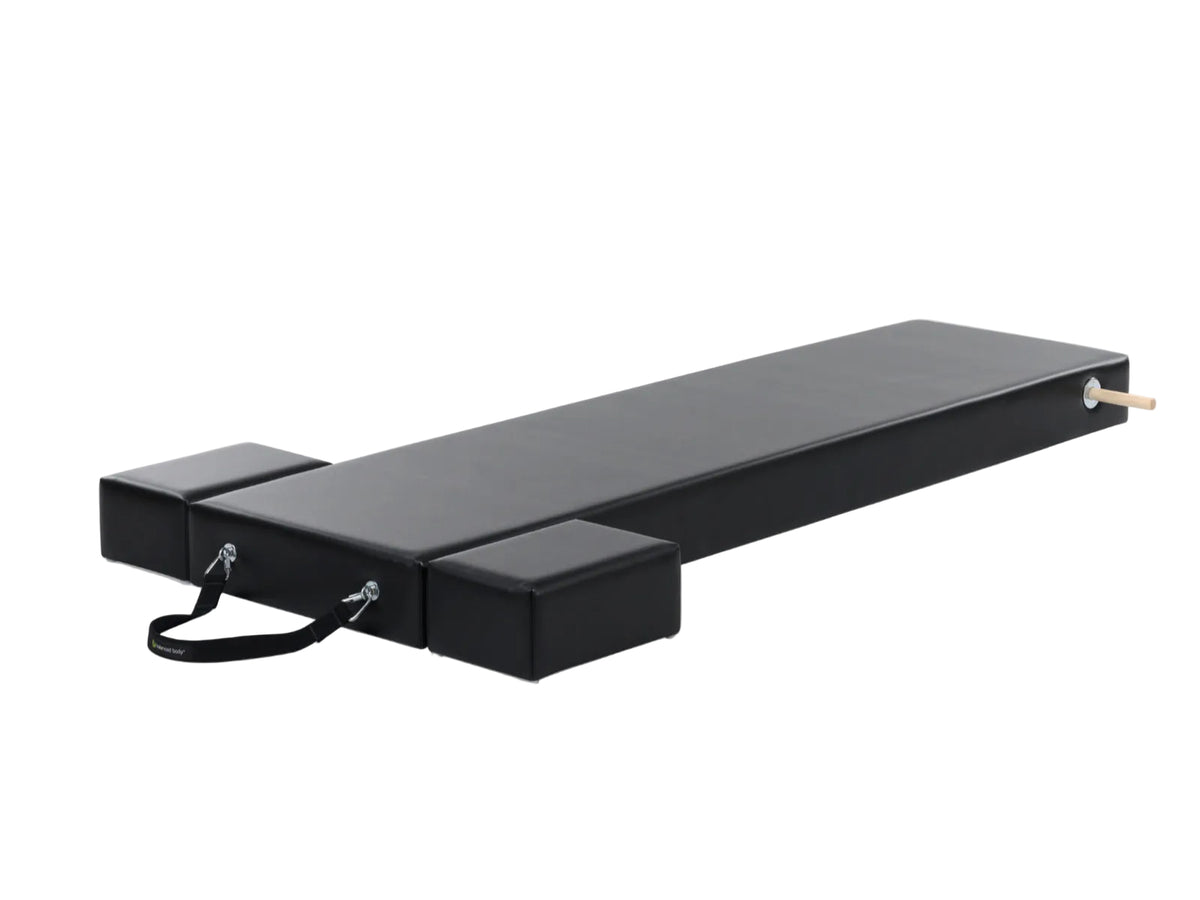 Balanced Body Raised Mat with two black Moon Boxes, oblique view, for Pilates Wall Tower Training